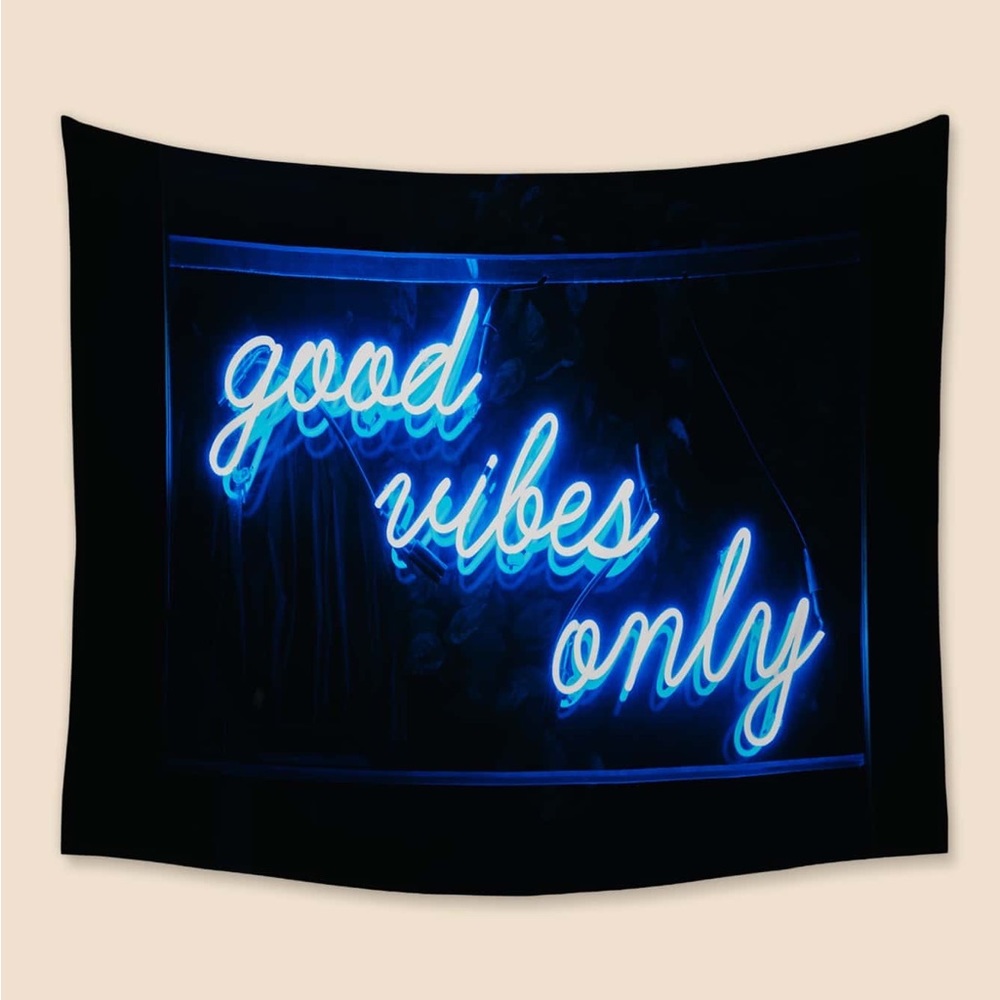 Black Tapestry with Blue Letters Graphic.